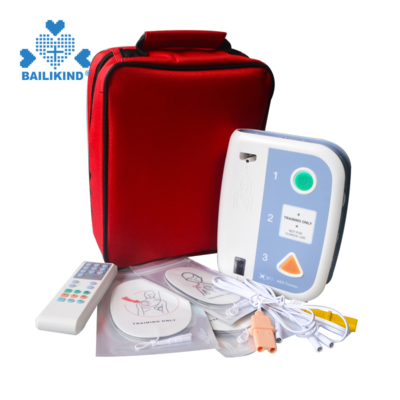 Yuav ua li cas siv AED Trainer Automated Sab Nraud Defibrillator Qhia Kev Pab Cuam Tshuam Rau Tsev Kawm Ntawv CPR Ob Hom Lus Qhia